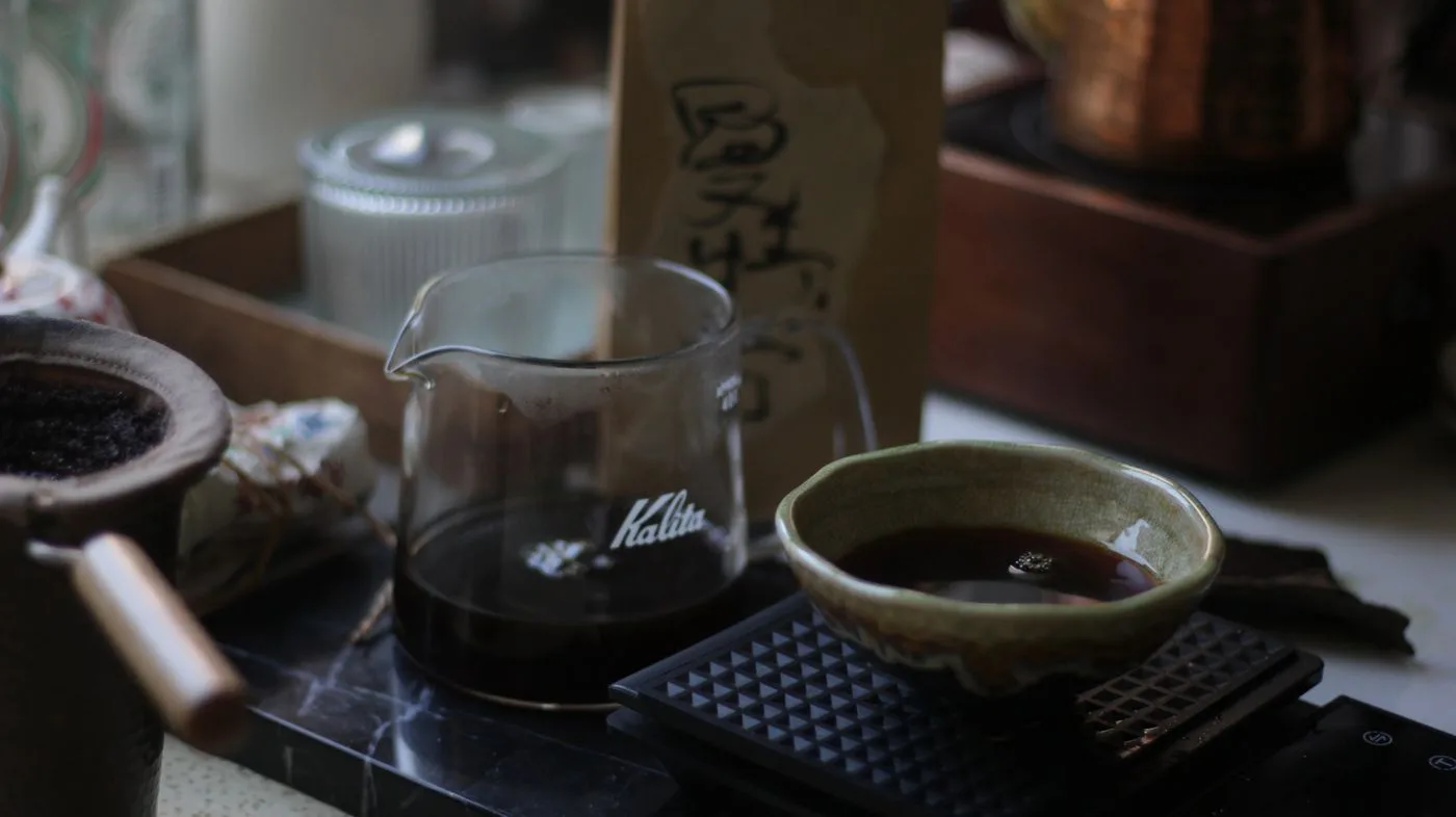 Measuring Cup with Coffee Set on Table