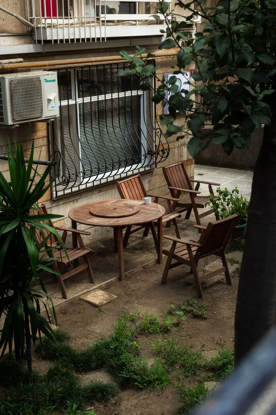 Cozy Outdoor Patio with Wooden Furniture