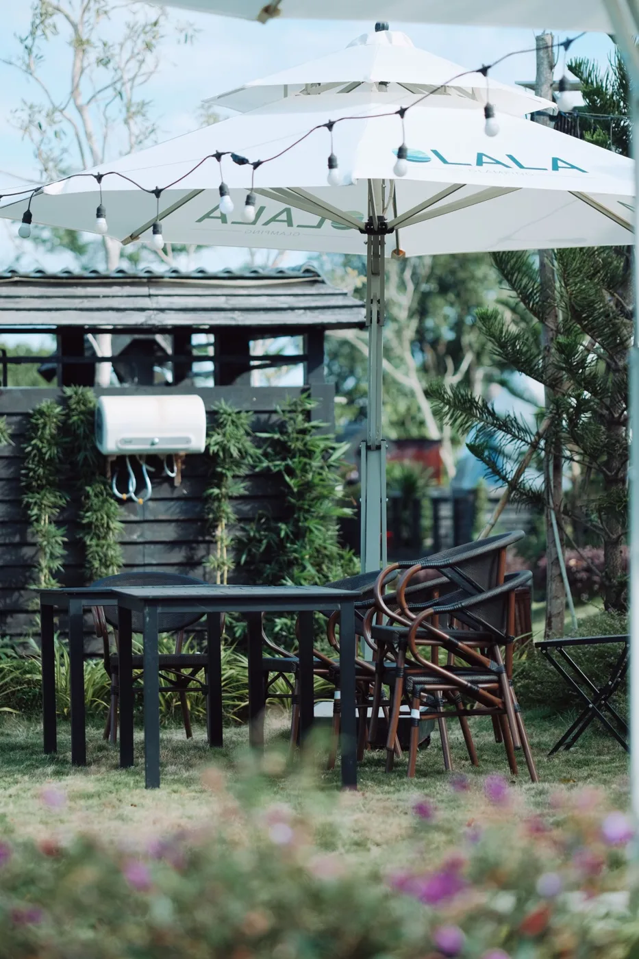 Outdoor Patio with Garden Furniture and Umbrella