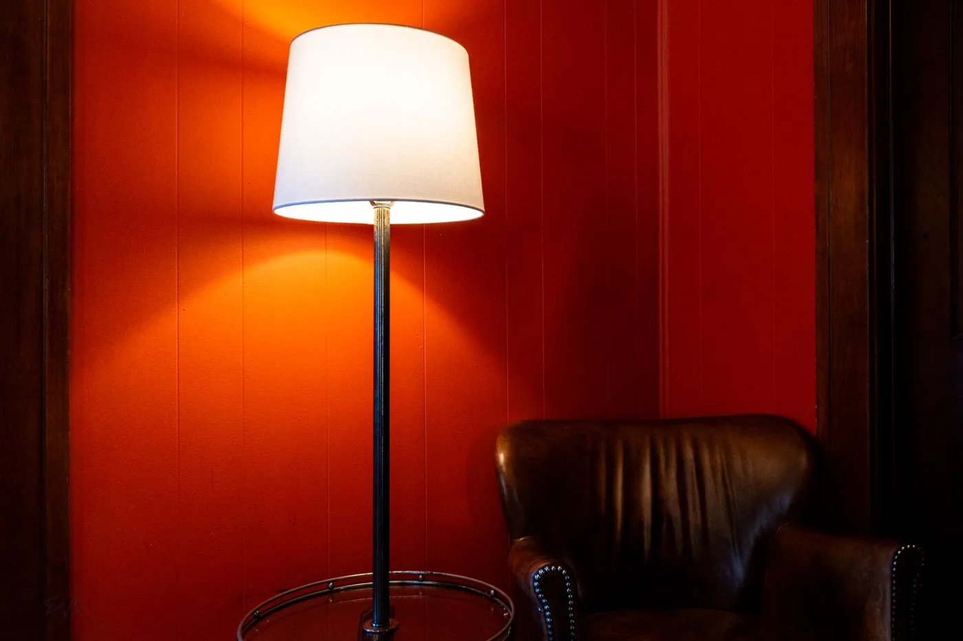 Cozy Corner with Leather Chair and Floor Lamp